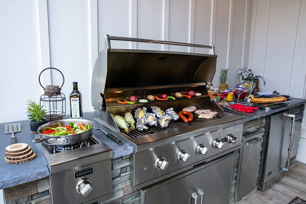 Smokey Ridge Grills Shop -Smokey Ridge Grills Shop close up of grill with popular grill food items being cooked on it